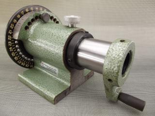 Spin indexer has controls for tens of degrees, unit degrees, end-float wavespring force, spindle lock, 5C collet fixing