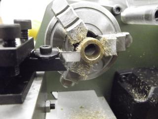 Parting brass on FD 150/E lathe with 44405 blade & optional 44407 toolpost
